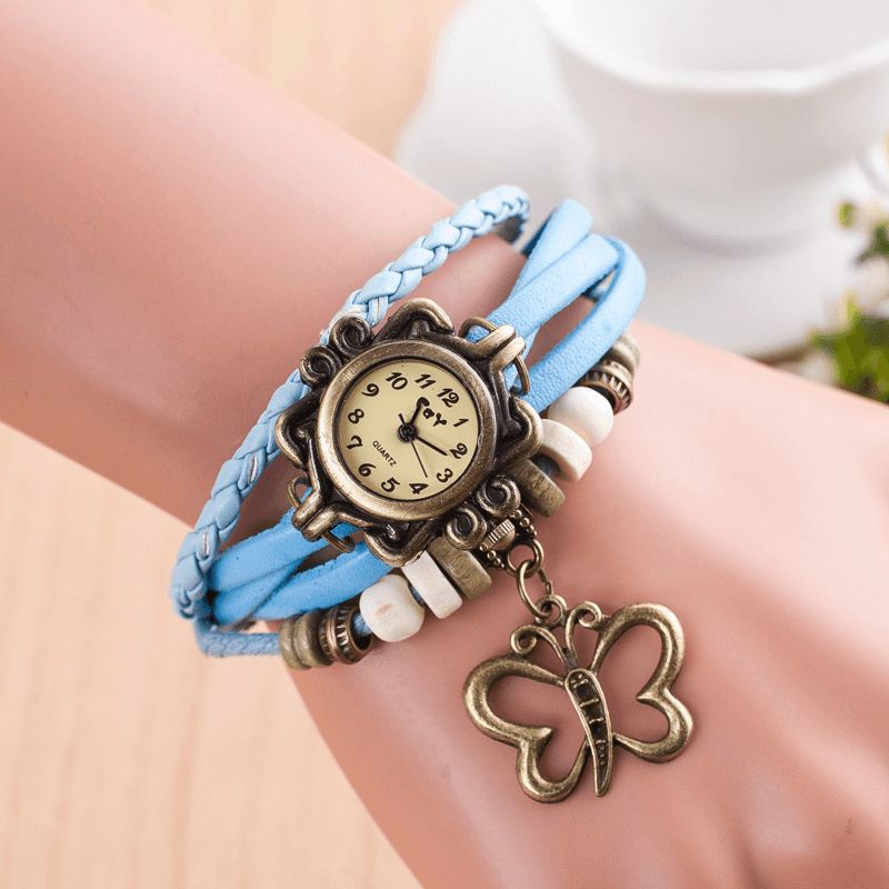 Dolaor Multicouche Vintage Femmes Montre Creux Papillon Pendentif En Cuir Rétro Bracelet Montre